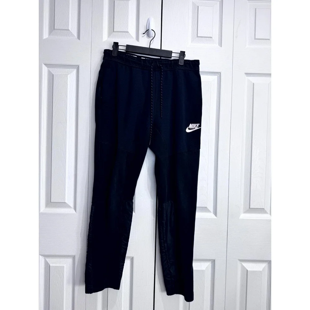 Nike Dri-Fit Jogger Sweatpants Mens‎ Medium Black Drawstring Logo Pull On Sports